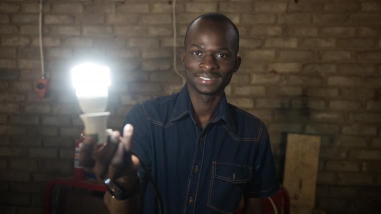 Inventor holding light